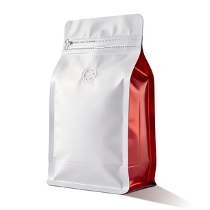 White coffee bean packaging bag with red side panel and one-way valve